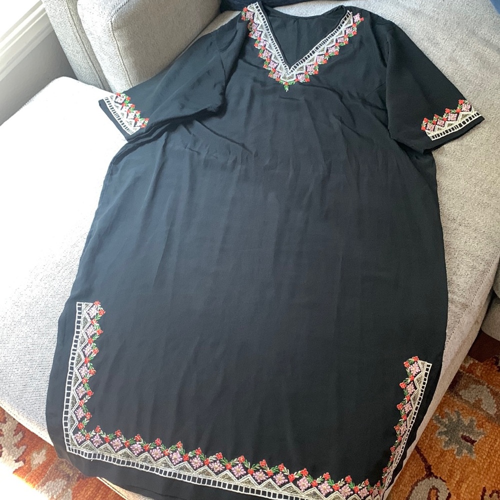 Light dress with intricate border